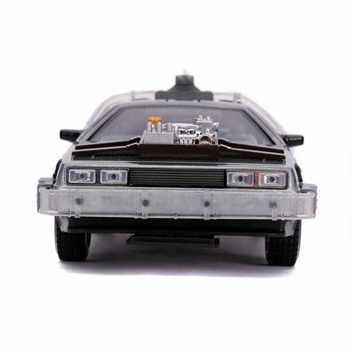 Back to the Future Part III die-cast (white-wall version) 1:24 scale "Hollywood Rides" light-up DeLorean Time Machine